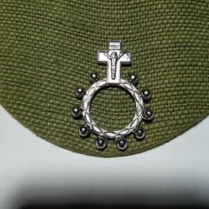 Women`s silver tone prayer beads ring.